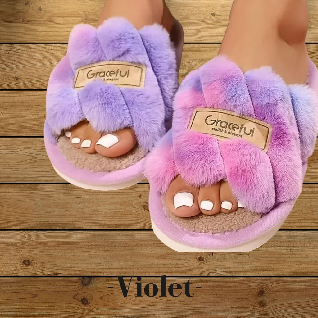 Pantoufles femme violettes en fausse fourrure moelleuse, confortables et élégantes pour vos instants cocooning.